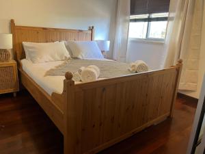 Ένα ή περισσότερα κρεβάτια σε δωμάτιο στο South Beach Holiday Home