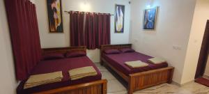 Postel nebo postele na pokoji v ubytování Coffee Street Homestay Sakleshpur