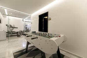 a room with a foosball table in a gym at DAR KAYIS & LAILA in Marrakesh