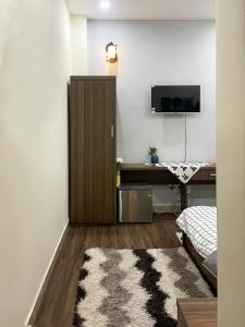 TV a/nebo společenská místnost v ubytování Little Chái Nho Homestay