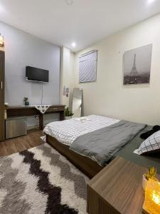 TV a/nebo společenská místnost v ubytování Little Chái Nho Homestay