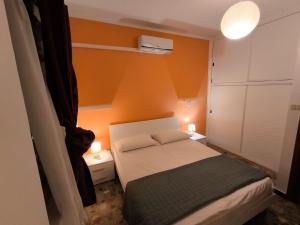 A bed or beds in a room at Casa Flavio