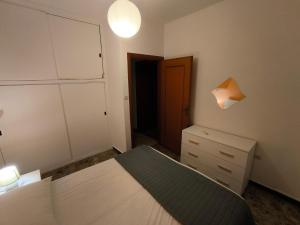 A bed or beds in a room at Casa Flavio