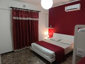 A bed or beds in a room at Casa Flavio