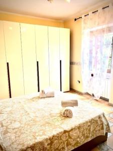Postel nebo postele na pokoji v ubytování Alex Room