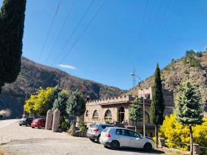a group of cars parked in front of a building at Restauraunt-Kalaja in (( Bokaj ))