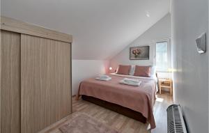 Postel nebo postele na pokoji v ubytování Four-Bedroom Holiday Home In Pregrada