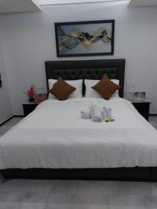 Voodi või voodid majutusasutuse Fields Hotel Carousel toas