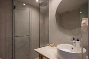 Kúpeľňa v ubytovaní Minos Hotel