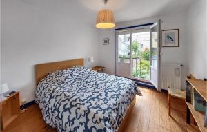 Ένα ή περισσότερα κρεβάτια σε δωμάτιο στο 2 Bedroom Awesome Home In Saint-Nazaire