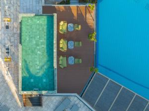 Bazén v ubytovaní Minos Hotel alebo v jeho blízkosti