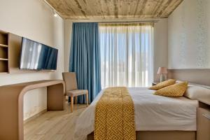 Postel nebo postele na pokoji v ubytování Cozy Rooms Hotel