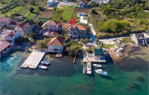 an aerial view of a town with boats in the water at Two-Bedroom Apartment In Ston in Ston