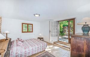 Posteľ alebo postele v izbe v ubytovaní 3 Bedroom Cozy Home In Taulis