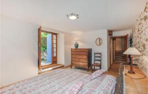 Posteľ alebo postele v izbe v ubytovaní 3 Bedroom Cozy Home In Taulis