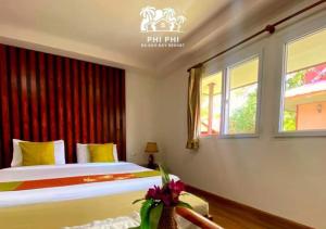 Katil atau katil-katil dalam bilik di Phi Phi Ba Kao Bay Resort