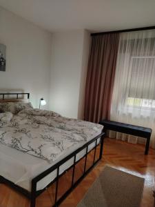 Postel nebo postele na pokoji v ubytování Balkan HOME