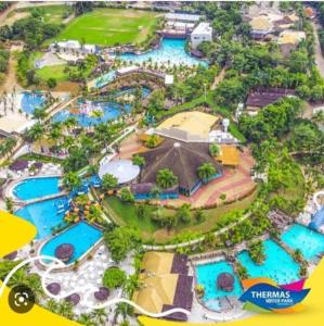 an aerial view of the water park at the mirias resort at Casa Holiday No pé da serra do Itaqueri com piscina in São Pedro