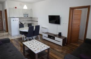 Kuchyň nebo kuchyňský kout v ubytování Apartman Petar + 28 fotografií