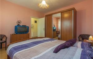 Posteľ alebo postele v izbe v ubytovaní Three-Bedroom Holiday Home In Buje