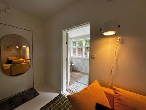 Ένα ή περισσότερα κρεβάτια σε δωμάτιο στο Vääksyn Mummola