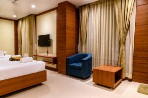 Ένα ή περισσότερα κρεβάτια σε δωμάτιο στο RS Regal Inn-Deoghar +66 φωτογραφίες