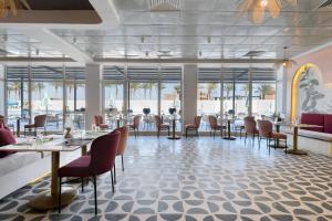 A restaurant or other place to eat at Flow Spectrum Resort Sahl Hasheesh