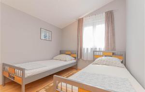 Posteľ alebo postele v izbe v ubytovaní Apartment Vodice With Sea View 11