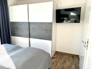 Postel nebo postele na pokoji v ubytování Küstenglück Dangast