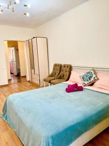 Katil atau katil-katil dalam bilik di Золотой Квадрат на проспекте Достык