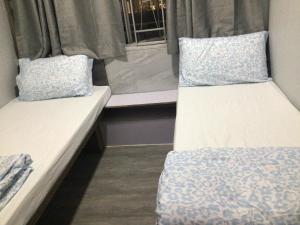 Katil atau katil-katil dalam bilik di Ajit guest house