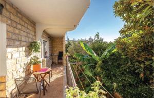 En have udenfor 3 Bedroom Cozy Apartment In Kostrena