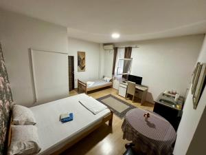Postel nebo postele na pokoji v ubytování Apartments Agape