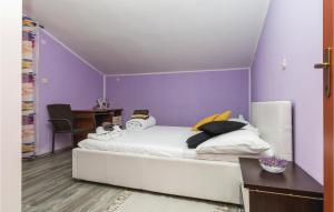Posteľ alebo postele v izbe v ubytovaní Four-Bedroom Holiday Home In Pristeg