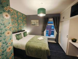 Ένα ή περισσότερα κρεβάτια σε δωμάτιο στο 2br Fortuna Meadow