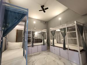 Mohit Paying Guest House客房内的一张或多张床位