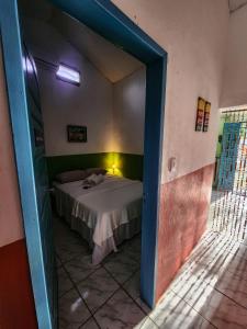 Postel nebo postele na pokoji v ubytování Casa Igarassu - Centro Histórico