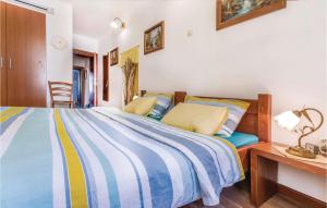 Postel nebo postele na pokoji v ubytování Holiday Home Trgovacka Iii