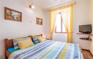 Postel nebo postele na pokoji v ubytování Holiday Home Trgovacka Iii