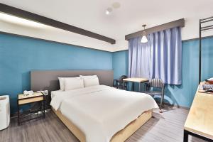 Postel nebo postele na pokoji v ubytování No 25 Hotel Yonghyun