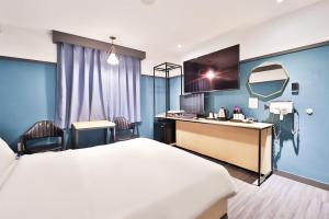 Postel nebo postele na pokoji v ubytování No 25 Hotel Yonghyun