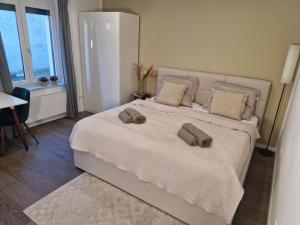Cama o camas de una habitación en Gästehaus in Köln Rath-Heumar