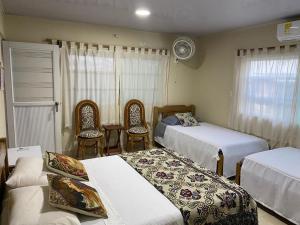 Katil atau katil-katil dalam bilik di Zéfiro Hostal