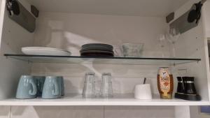 Una cocina o zona de cocina en Gästehaus in Köln Rath-Heumar