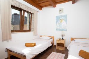 Posteľ alebo postele v izbe v ubytovaní Villa Lux Casa Histria 2