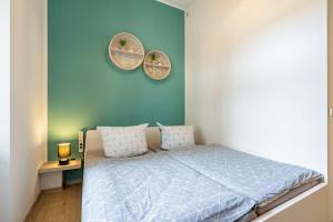 Ένα ή περισσότερα κρεβάτια σε δωμάτιο στο Zentrumsnahe Wohnung