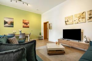 Μια τηλεόραση ή/και κέντρο ψυχαγωγίας στο Zentrumsnahe Wohnung