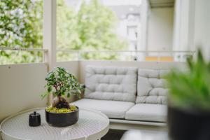 Posezení v ubytování EDLER WOHNRAUM Luxuriöse 2 SZ mit Balkon, Kaffeevollautomat, Klima & Lift