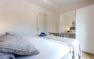Postel nebo postele na pokoji v ubytování Apartment Raduniceva I