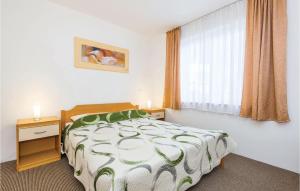 Postel nebo postele na pokoji v ubytování Cozy Apartment In Moscenicka Draga